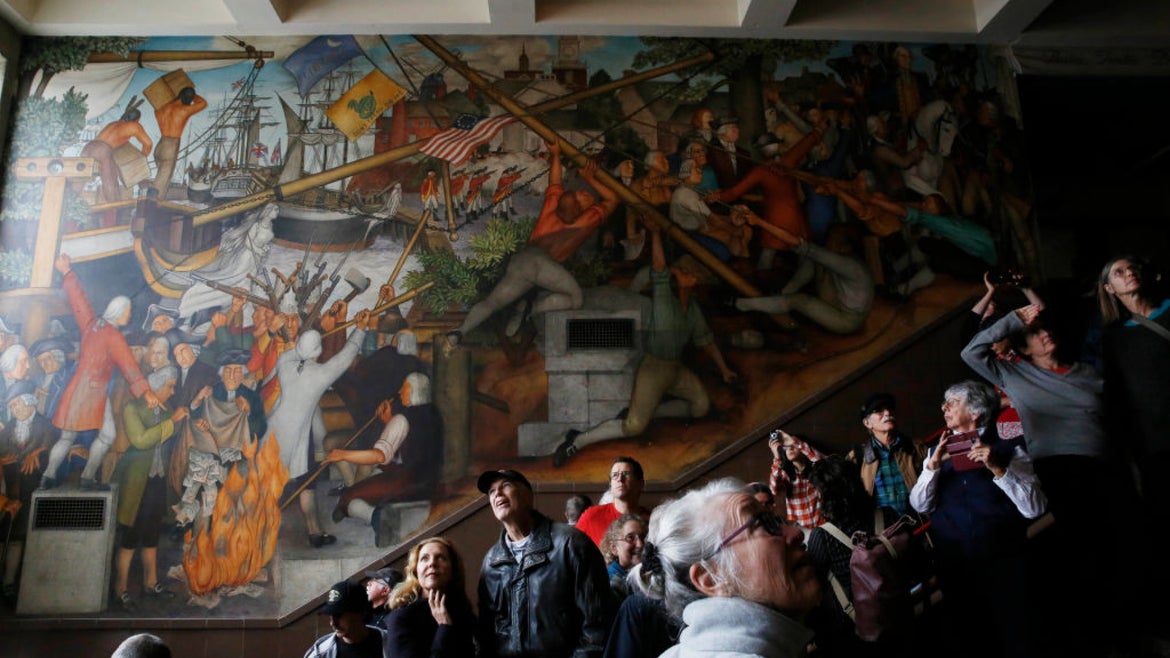 Life of Washinton Mural surrounded by crowd