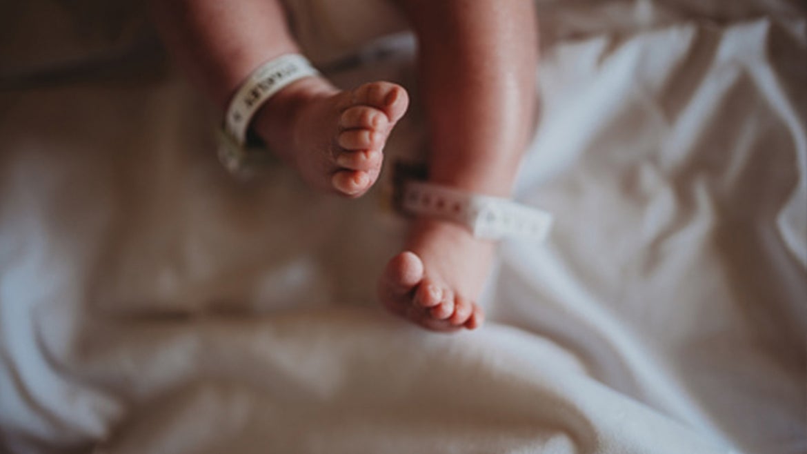 A stock image of a newborn's feet.
