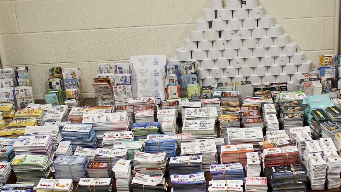 During a search of Lori Ann Talens' home, agents found thousands of counterfeit coupons, rolls of coupon paper, and coupon designs for more than 13,000 products on her computer.
