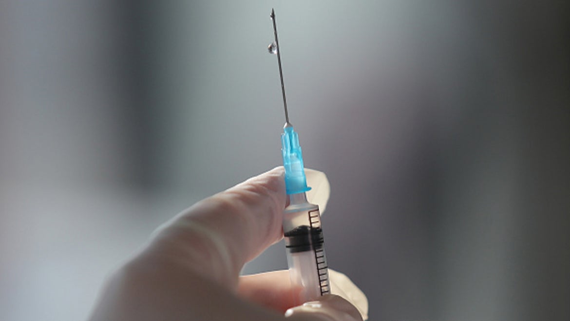 A stock image of a needle injection. 