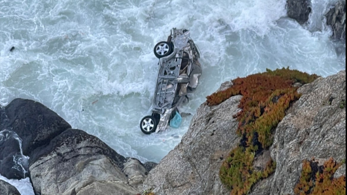 The car dove into the ocean after careening off Highway 1.