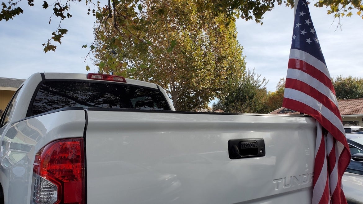 Side view of white Ford F150 pickup truck in Danville, California, August 13, 2019. 