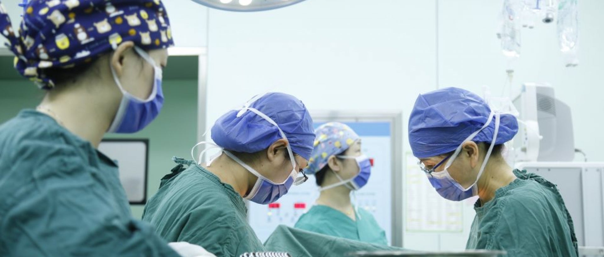 Group of doctors in a operating 