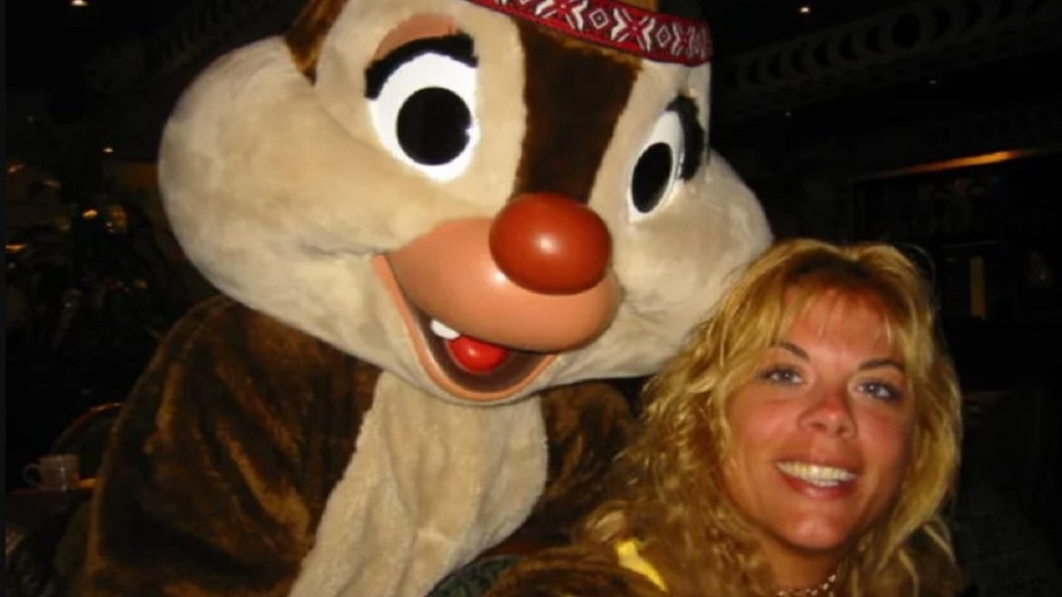 Blonde woman with Disney character