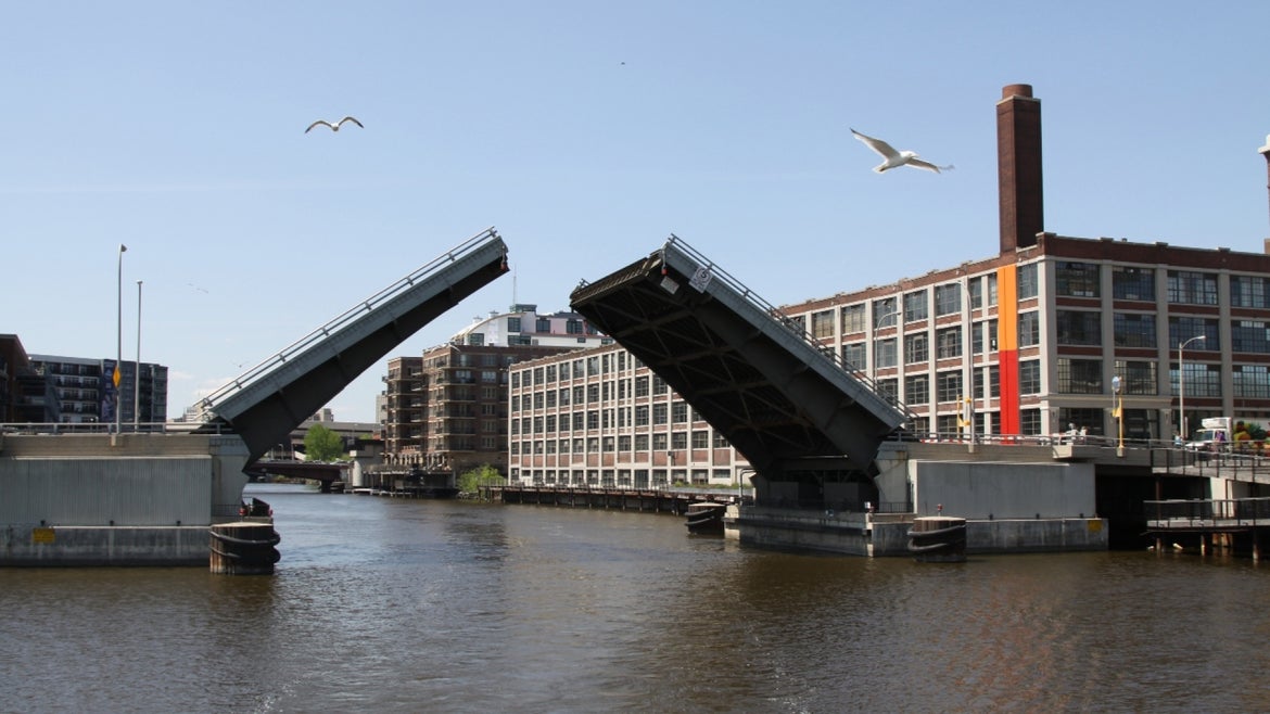 drawbridge opens over river