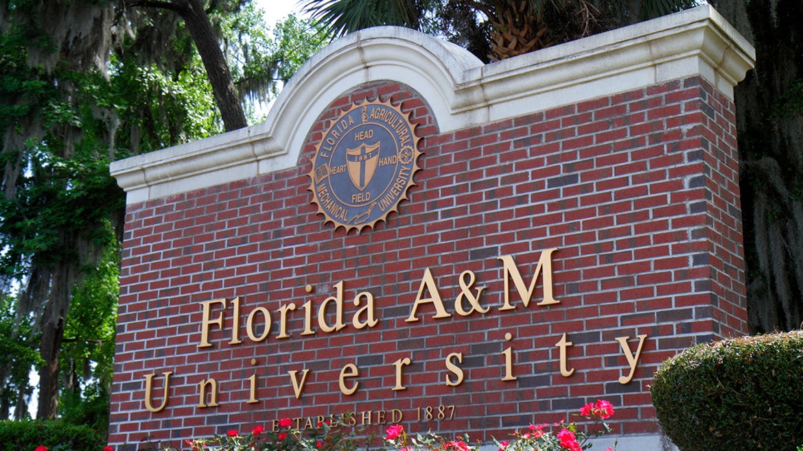 Standing brick sign saying "Florida A&M University Established 1887