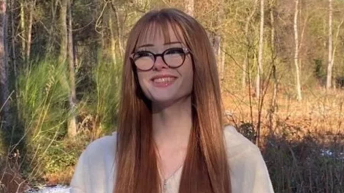 16-year-old Brianna Ghey, white, light blond hair, round black glasses, smiling