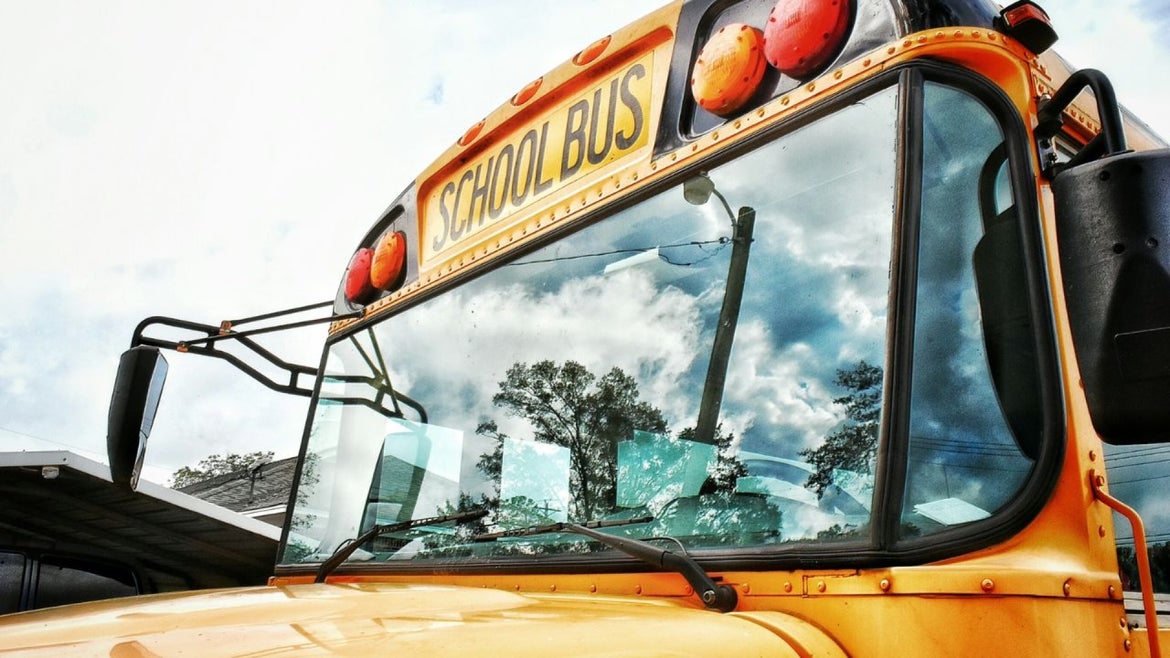 Close up of front yellow school bus window