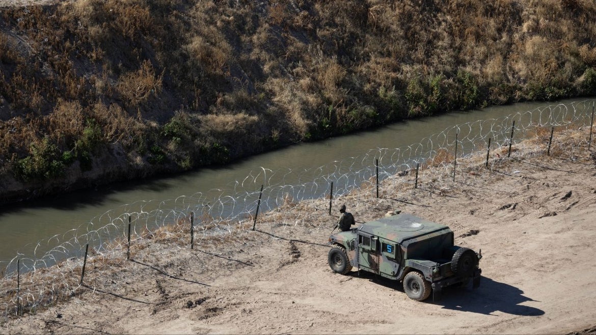  A Texas National Guard soldiers guard the U.S.-Mexico border on January 08, 2023 in El Paso, Texas